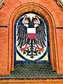 Mosaic from the vertical-lift bridge over the Elbe–Lübeck Canal below the castle gate