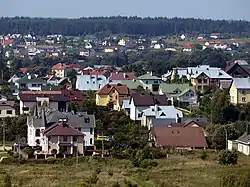 Private houses, built after the 1992 in Gineitiškės village as seen from Pašilaičiai tower blocks