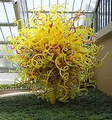 A glass sculpture by Dale Chihuly, "The Sun" at the "Gardens of Glass" exhibition in Kew Gardens, London