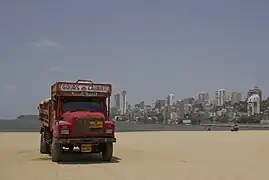 Decorated truck at a beach in Mumbai.