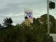 A sign spinner hired for the closing sale in Capitola, California.