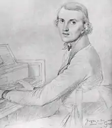 young man, clean shaven, in early 19th-century clothes, sitting at a piano keyboard and looking towards the viewer