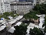 Greenmarket Square as it normally appears with many market stalls, seven days before the lockdown.