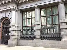 'Grindlay & Co' lettering can still be seen on the railings outside 54 and 55 Parliament Street (2017)