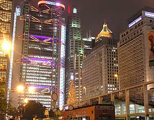 The HSBC Headquarters Building (left) and its neighbourhood at night.