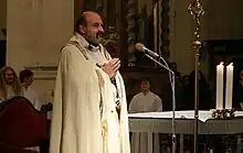 Halík celebrating a Mass in St. Salvator Church, Prague