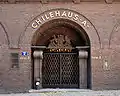 Entrance A - note the Coat of arms of Chile atop the gates.