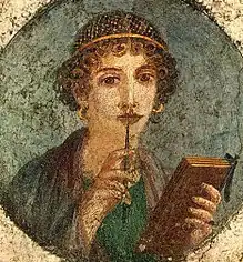 Image 35Woman holding wax tablets in the form of the codex. Wall painting from Pompeii, before 79 CE. (from History of books)