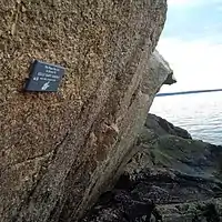 A memorial plaque at Herring Cove