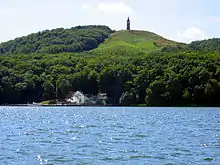 Himmelbjerget with the steam ship Hjejlen in the foreground.