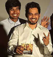 Jeeva (L) and Adhi (R) during Aambala's audio launch