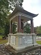 HMS Orlando memorial, Grade II listed. The bell was captured from the Taku Forts in China in 1890.