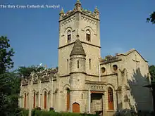 a brick fortified Gothic Revival church