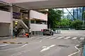 A zebra crossing outfitted with Belisha beacons in Hong Kong