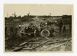 A damaged car after being thrown 200 ft (61 m) by the tornado