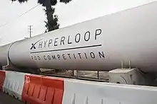 A long white tube about 10 feet in diameter