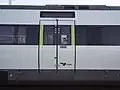 DSB logo in dark blue and entry doors partially in green (unit 5639)