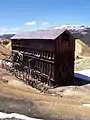 Inside-out framing has the studs on the outside and is typically used for material storage structures like this ore-bin at a mine.