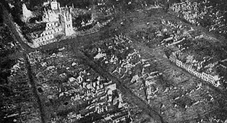 The ruined city centre with the hall and the cathedral at the end of the war