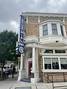 The Industrial Bank Storefront on U Street in Washington, featuring neon signage