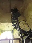 A spiral staircase leading to the top of the belltower