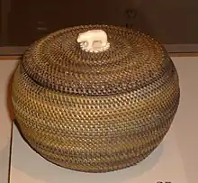 Inupiat basket of whale baleen with a walrus ivory finial, Barrow, Alaska