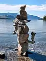 Inuksuk on Osoyoos Lake shore of Sẁiẁs Provincial Park in Osoyoos, looking south with Washington state near Oroville in the distance (July 2020)