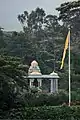 Iravian temple view from afar with flag