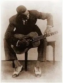 Oviedo playing the tres, c. 1930.