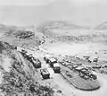 Italian vehicles abandoned on the road to Amba Alagi.