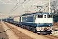 JR East EF65 1029 pulling the Orient Express '88 past Shinmachi Station in late 1988