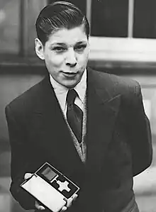 Jack Bamford circa 1953 holding his George Cross award