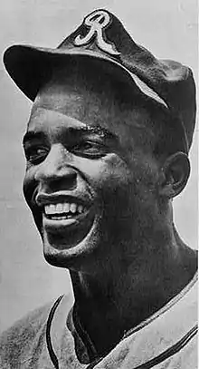 Robinson posing in the uniform cap of the Kansas City Royals, a California Winter League barnstorming team, November 1945 (photo by Maurice Terrell)