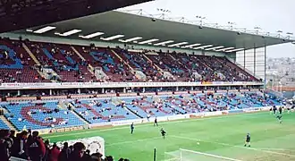 Front view of a two-tiered stand at a football stadium