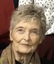 tight headshot of Roose, an older white woman with short hair