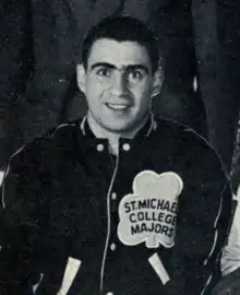 Black and white photo of Jim Gregory wearing a Toronto St. Michael's Majors jacket