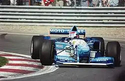 Johnny Herbert racing for Benetton (non-tobacco livery) at Montreal in 1995