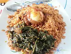 Image 29Jollof rice with vegetables and a boiled egg (from Malian cuisine)