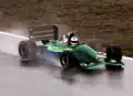 Michael Schumacher driving the Jordan 191 at the 1991 Belgian Grand Prix, with primary sponsorship from 7-Up.