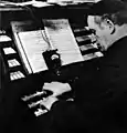 Jörg Mager playing his organ, c. 1938, photographer unknown, PIX Magazine