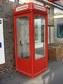 Photo of a red K8 telephone box