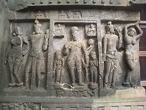 Entrance, left panel with Mithuna couples, and central Mahayana-period panel.