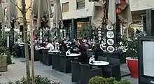 Image 45Croatians in a caffe bar on Petar Preradović Square, also known as "Flowers Square" (Cvjetni trg), in Zagreb (from Culture of Croatia)