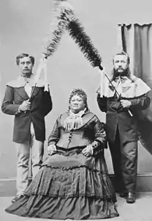 two men with Hawaiian woman