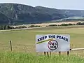 Signs protesting the Site C dam along Highway 29 between Fort St. John and Hudson's Hope, 2014