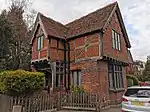 Kelsey Lodge, a Grade II–listed late Victorian Tudor Revival lodge by the eastern entrance off Wickham Rd.