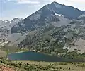 North aspect of Kennedy Peak rises above Kennedy Lake