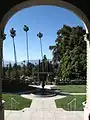 View from the front porch showing the gardens and the San Bernardino Valley beyond.