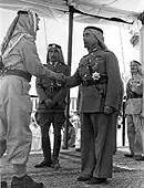 King Talal (2nd from left) with his father King Abdullah I (2nd from right) in 1946