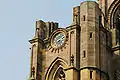 Clock on the unfinished tower